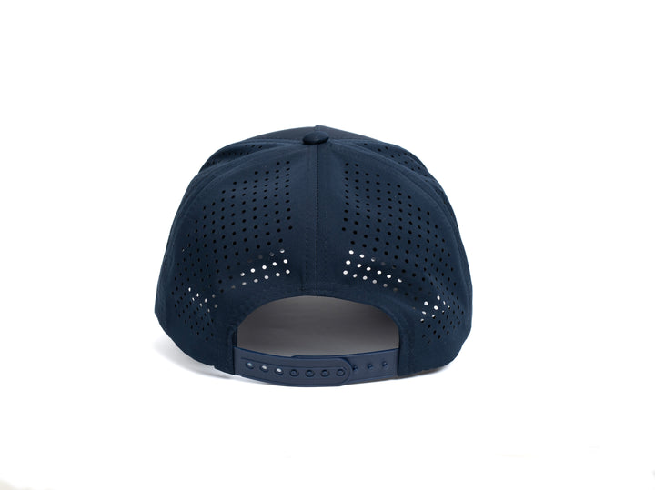 Back view of navy blue premium golf hat with adjustable strap and ventilation holes