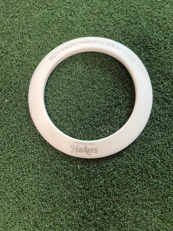 Hometown Hackers portable putting practice aid in white designed for improving golf putting skills
