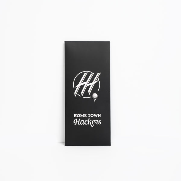 Black packaging box for premium golf glove for lefties with Home Town Hackers logo