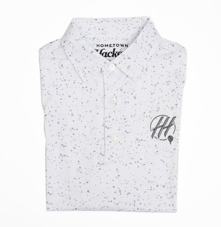 Hometown Hackers white premium golf polo shirt with subtle gray splatter pattern and logo on chest