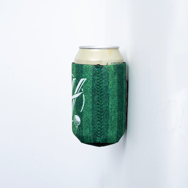 Green striped drink koozie with white design holding a canned beverage