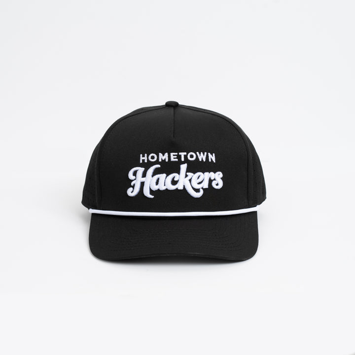 Black premium golf hat with white embroidered Hometown Hackers text and white trim detail
