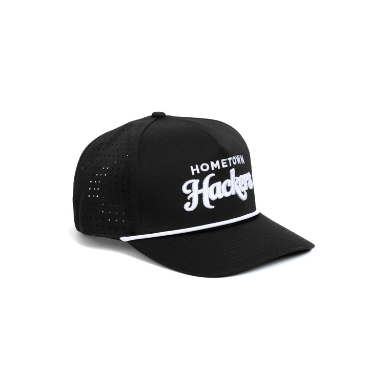 Black premium golf hat with white Hometown Hackers logo and breathable perforated back panels